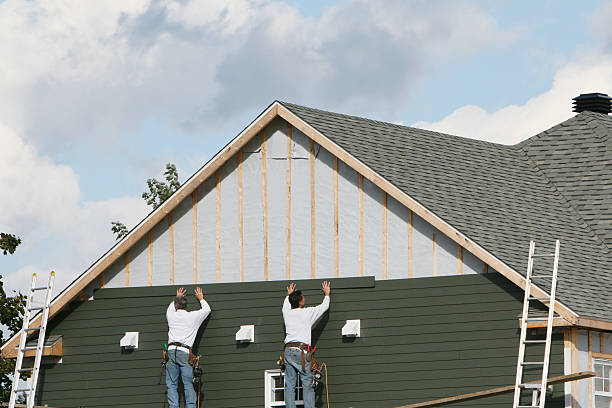 Professional Siding technician working in Worthington, IN